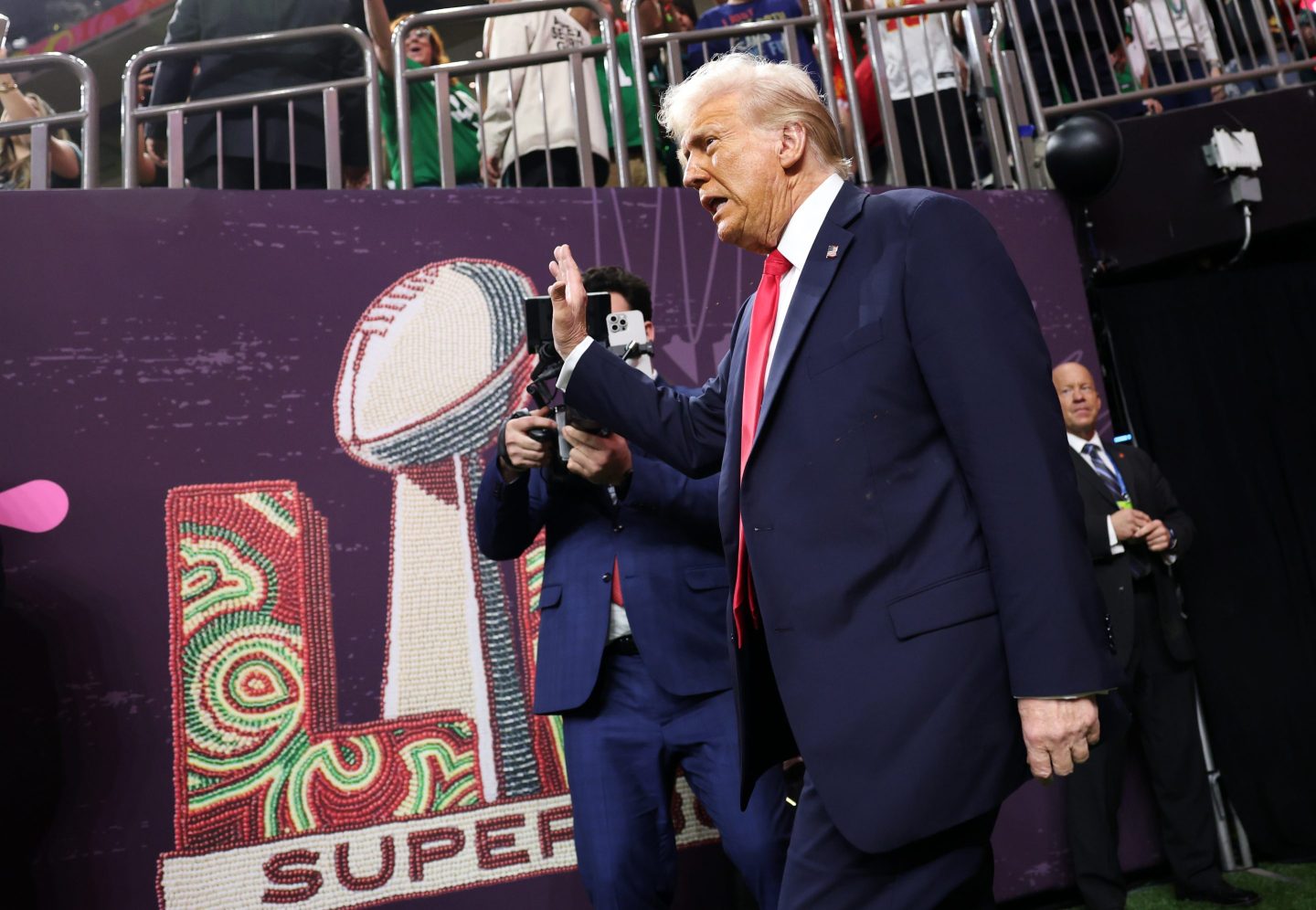 NEW ORLEANS, LOUISIANA - FEBRUARY 09: U.S. President Donald Trump walks onto the field prior to Super Bowl LIX between the Kansas City Chiefs and the Philadelphia Eagles at Caesars Superdome on February 09, 2025 in New Orleans, Louisiana. (Photo by Jamie Squire/Getty Images)